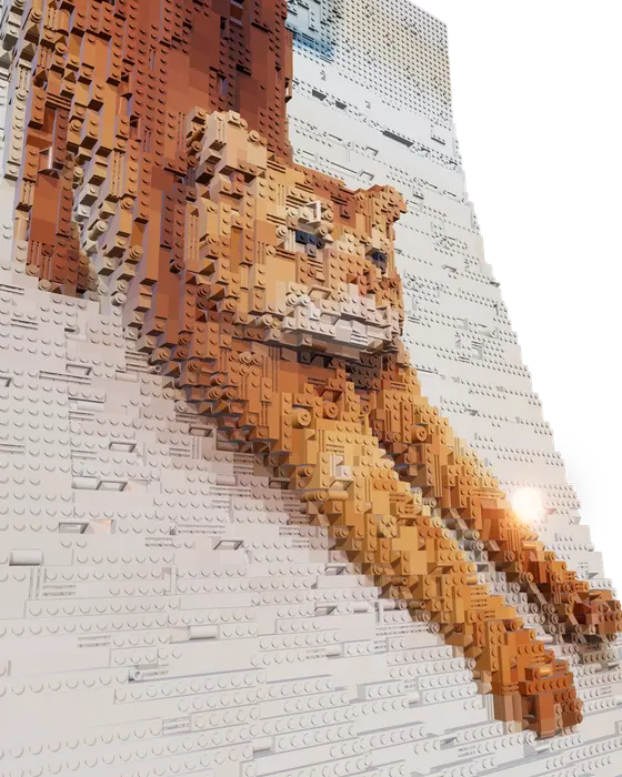 Ginger cat mid-stretch, in bricks